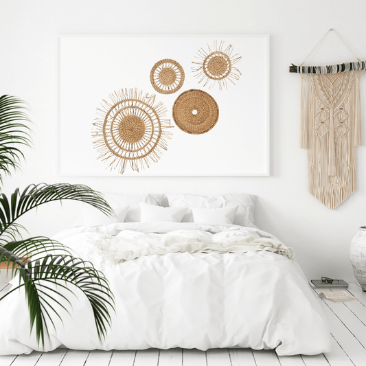 Bedroom with white bedding, decorative wall art, and plants.