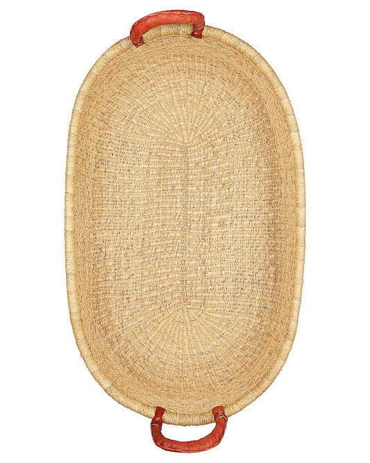 Artisan-woven baby change basket with a natural finish