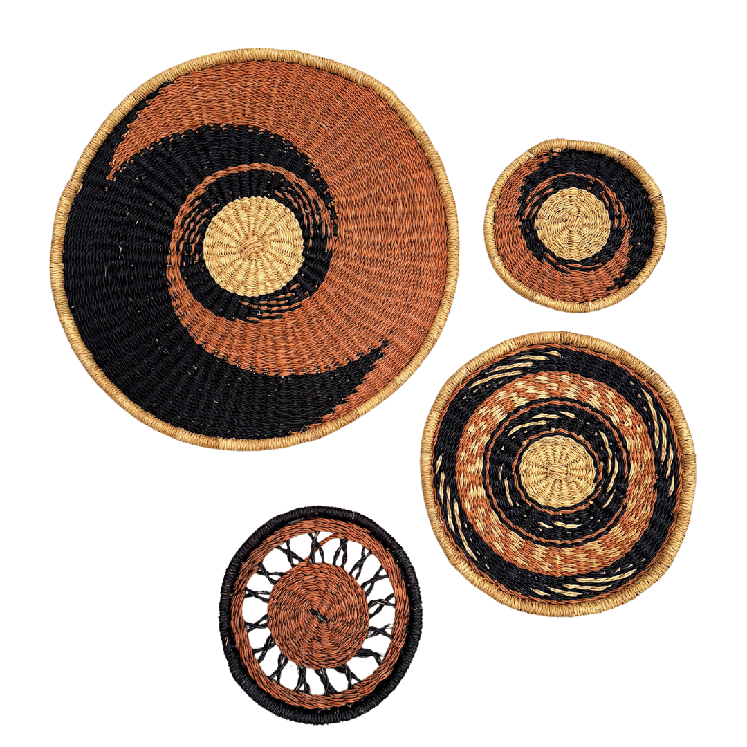Set of woven baskets with black and brown patterns on a white background