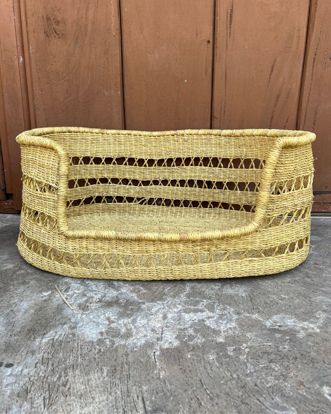 Handmade woven dog basket in natural elephant grass