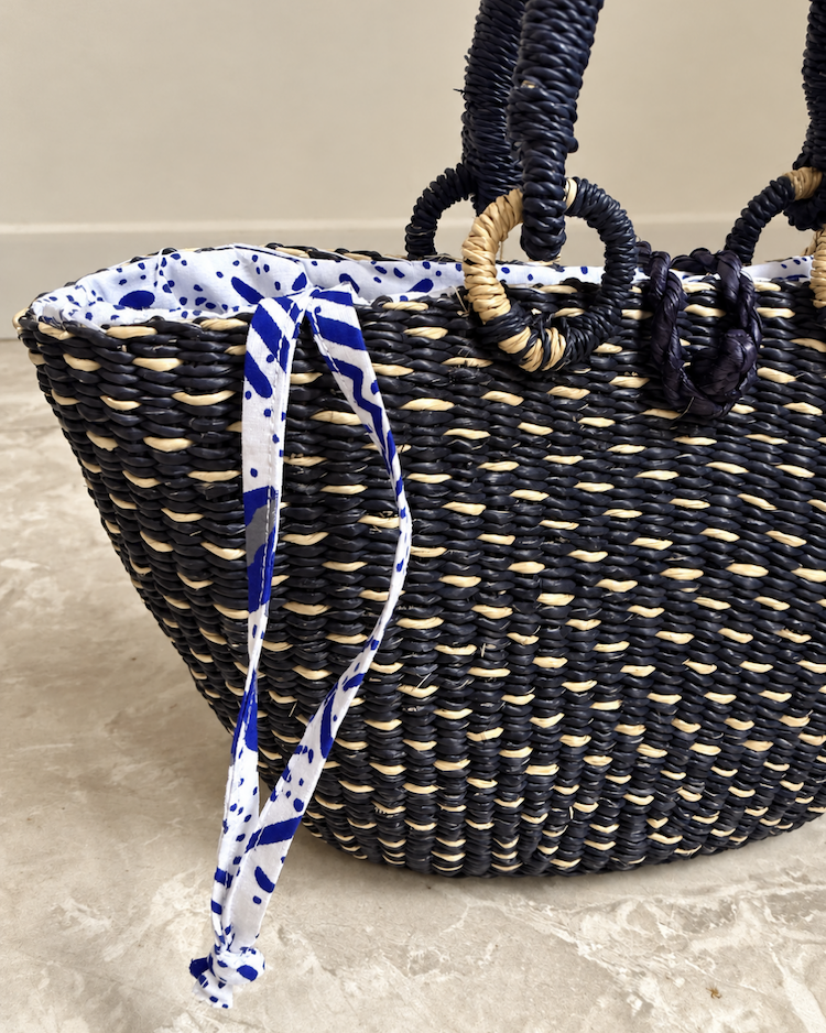 Open straw handbag showing space for everyday essentials