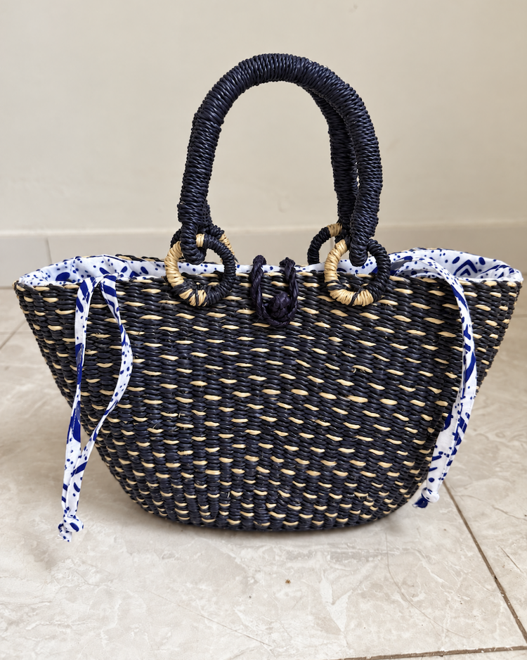 Front view of the handwoven straw handbag