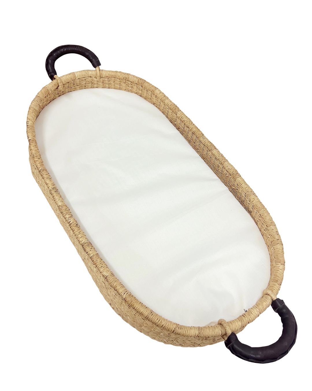 Handwoven nappy change basket made from natural Ghanaian straw