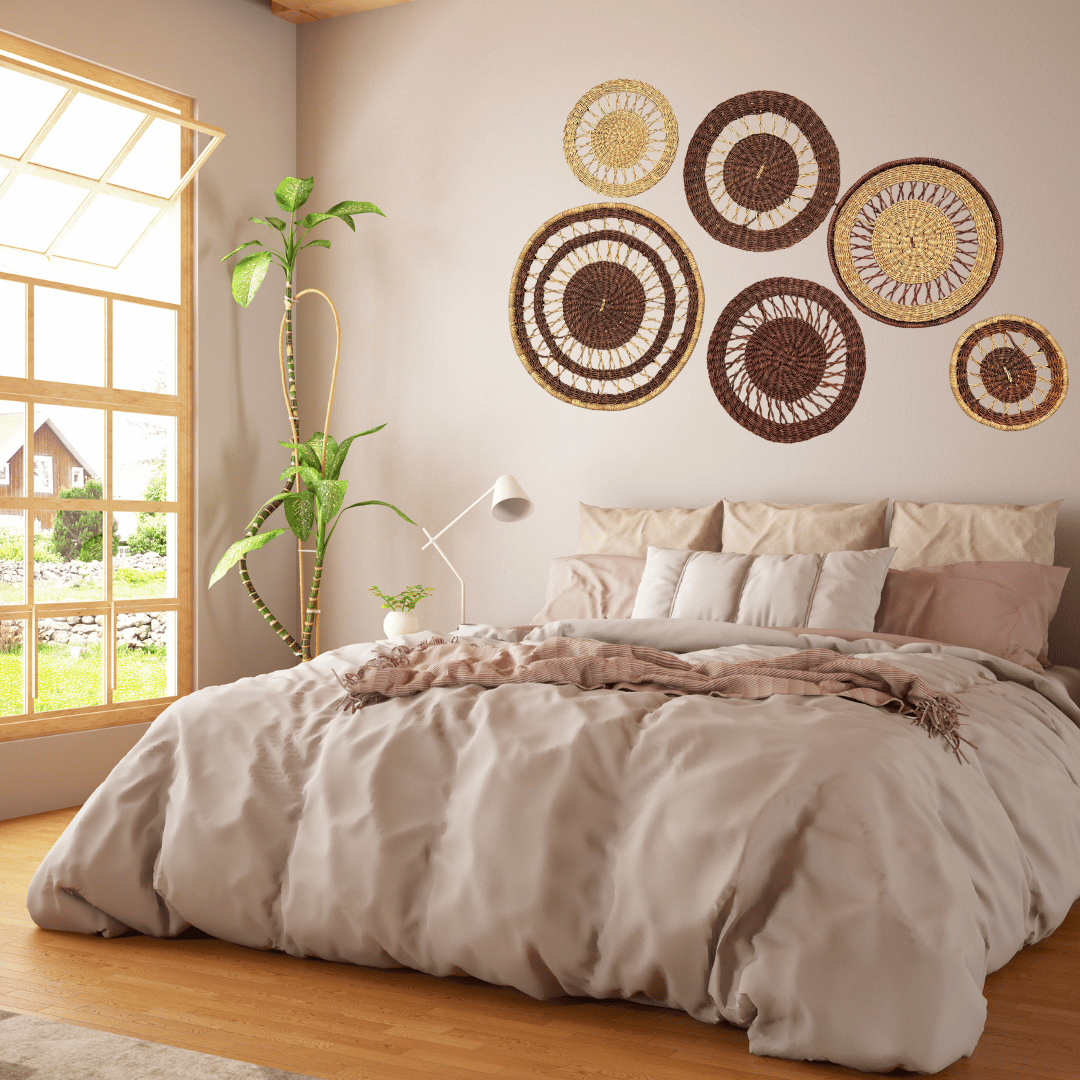 Bedroom with decorative wall baskets and a large window.