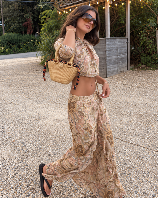 Handwoven straw handbag styled with an everyday outfit