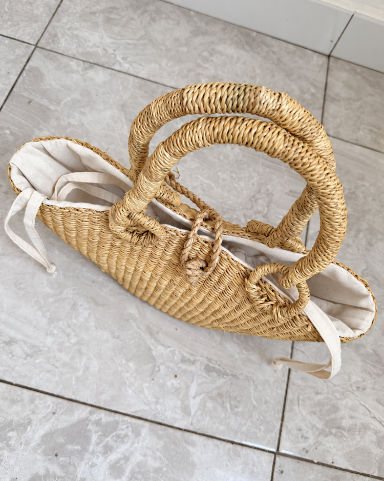 Top view of the handwoven straw handbag