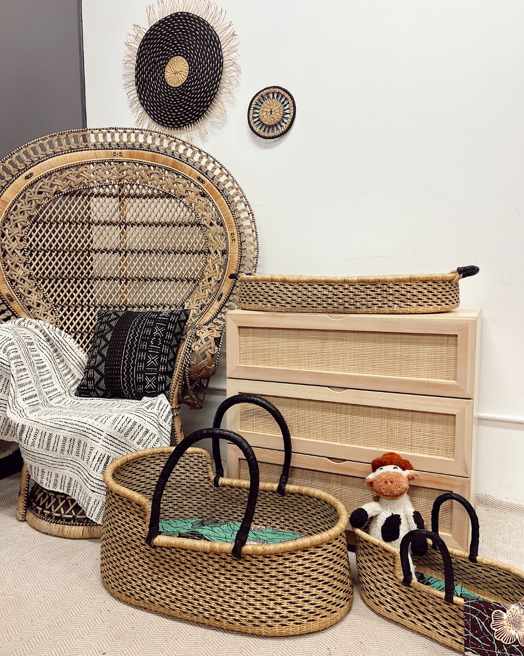 Coordinated natural woven baskets for a neutral baby nursery