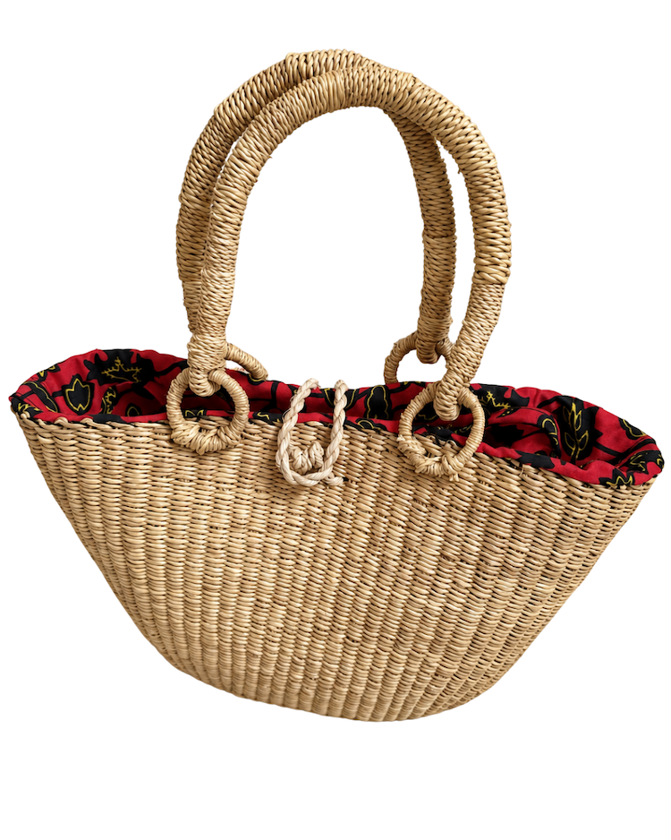 Angled front view of the handwoven raffia handbag